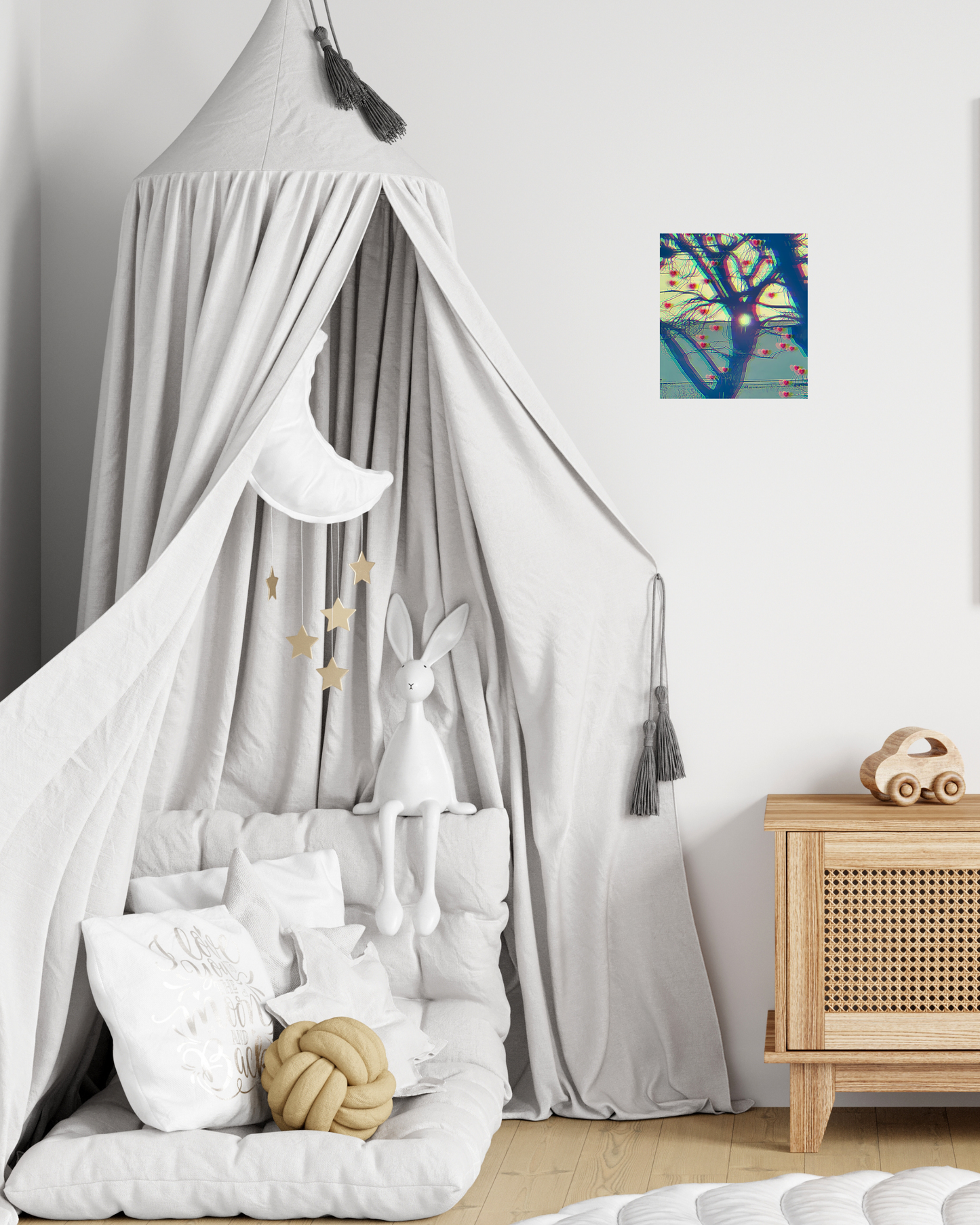 Young children's room with a canopy bed, toys, small dresser, and original blue love tree wall art