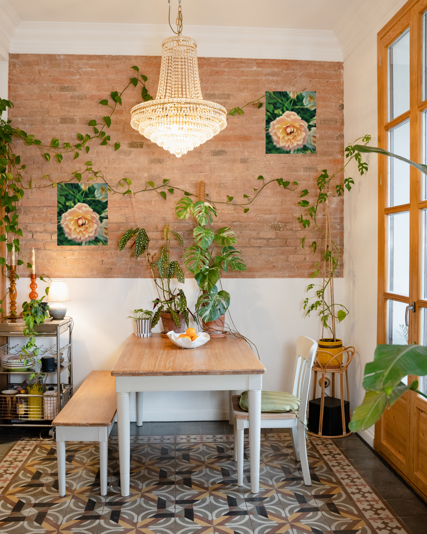 upgraded contemporary dining room with brick wall elegant lighting natural tones and pink rose wall art to match plants