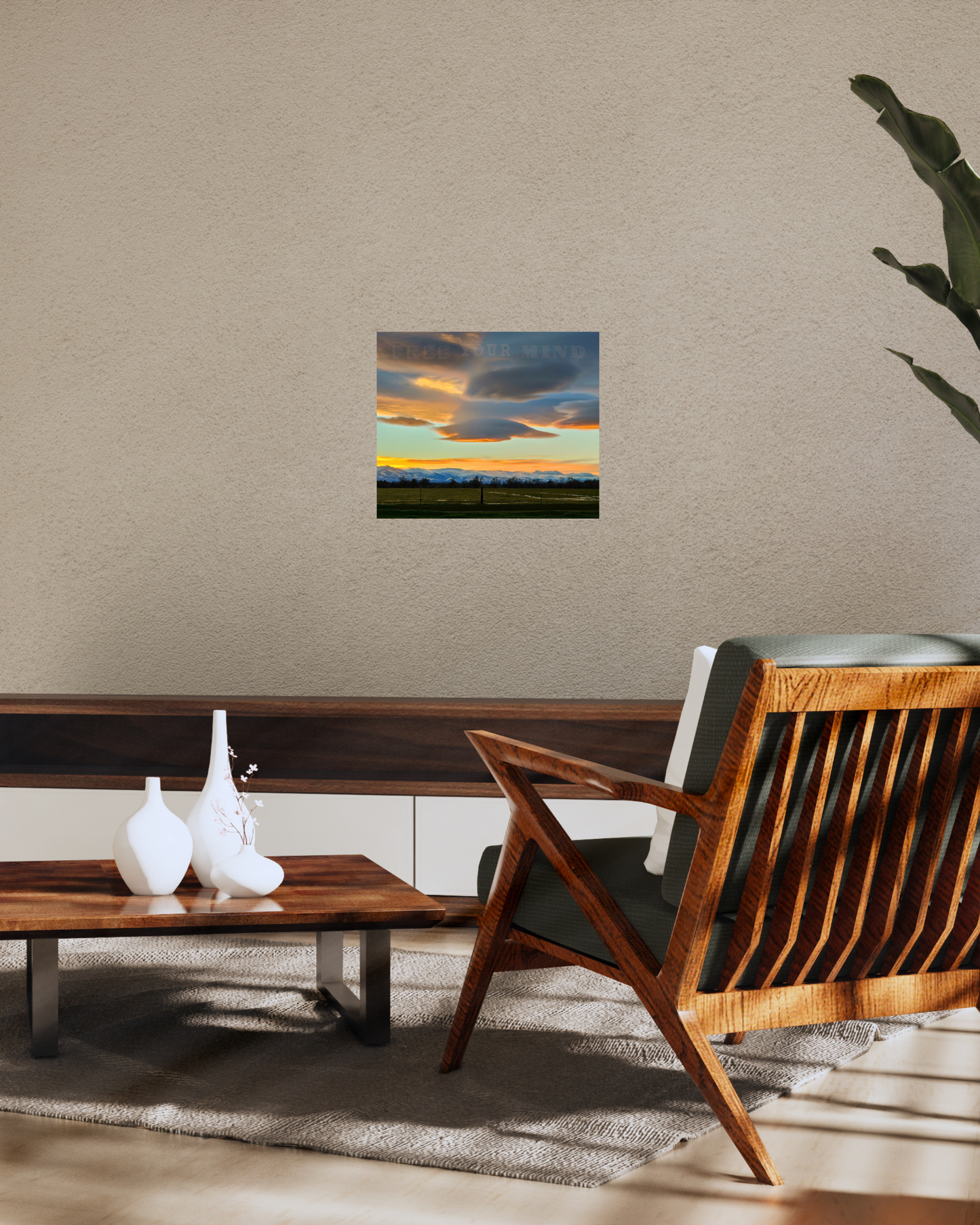laid back modern living room with earthy tones and vibrant sunset wall art with a consciousness vibe