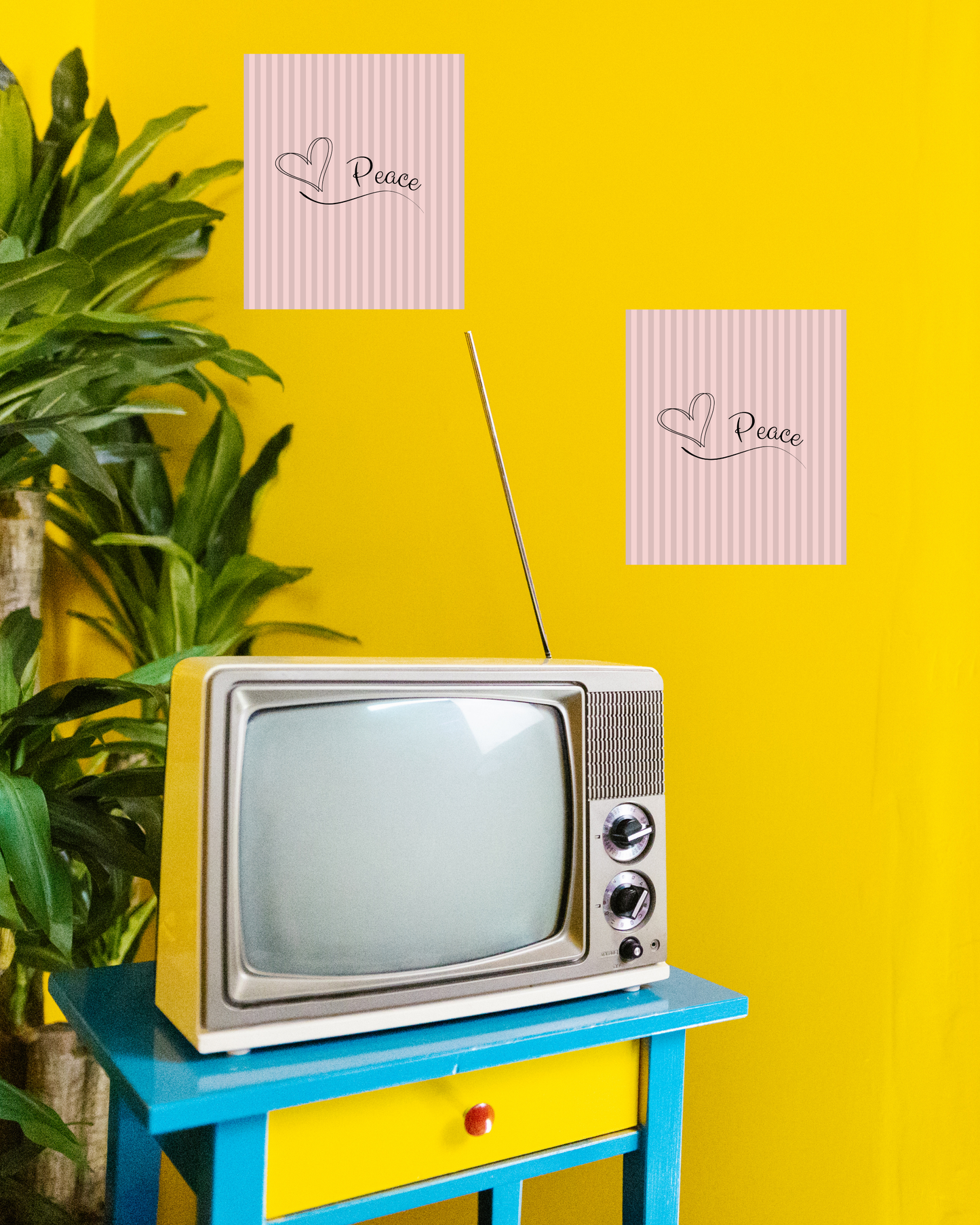 Classic pink striped wall print with peace script juxtaposed by a 70's style room with bright yellow walls and tv