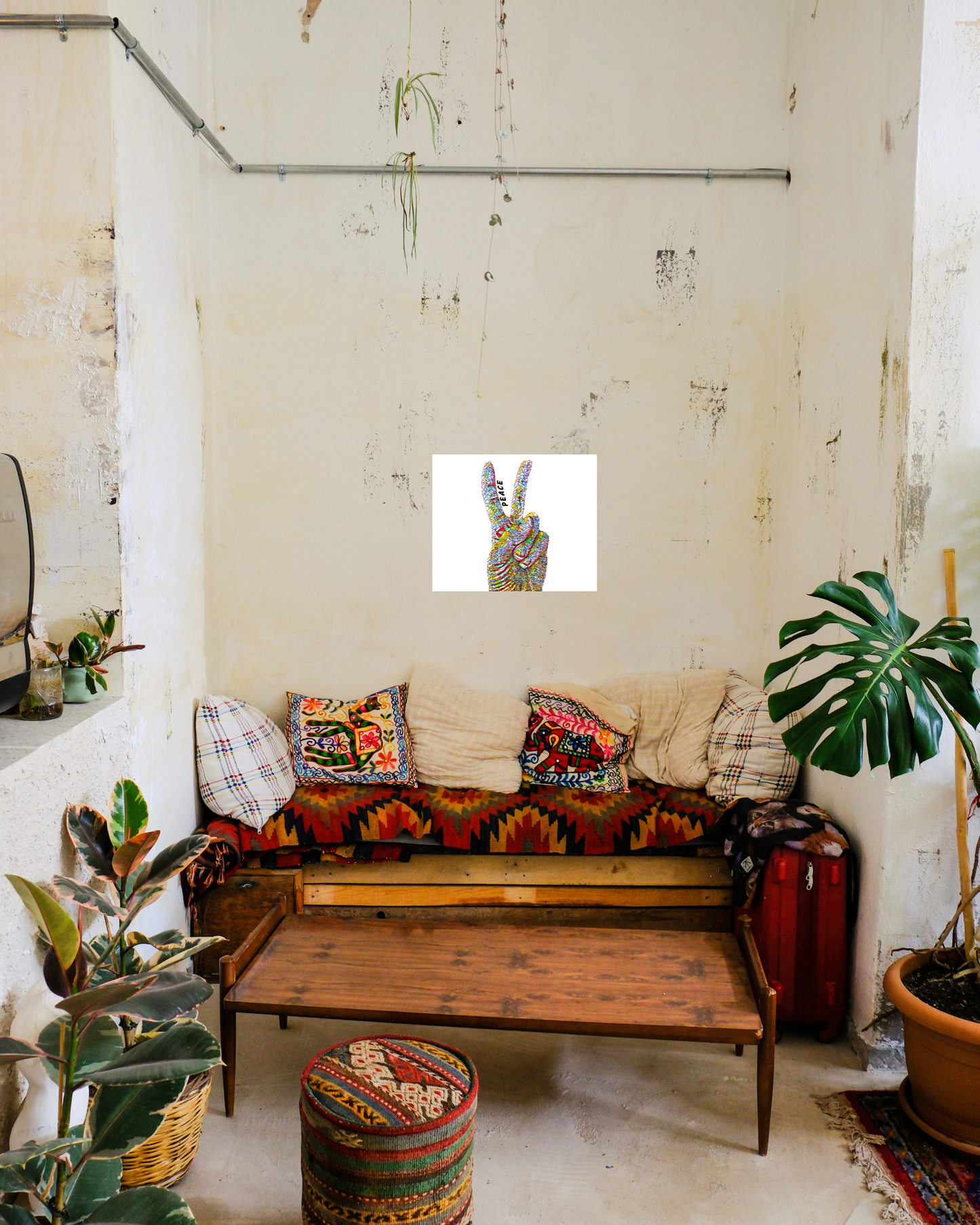 boho southwestern style lounge space with colorful peace sign pop art in mosaic style