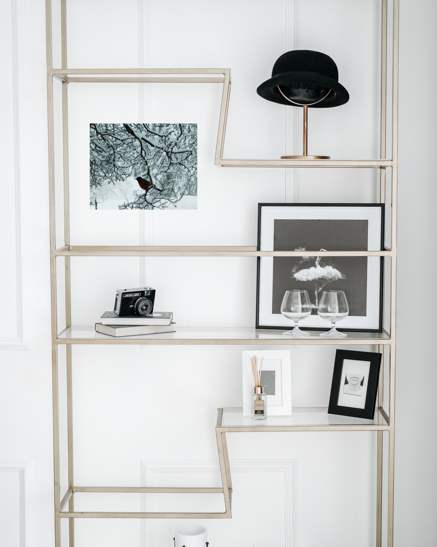 classic chic decor with winter wall art depicting a single bird in a frozen tree after fresh fallen snow
