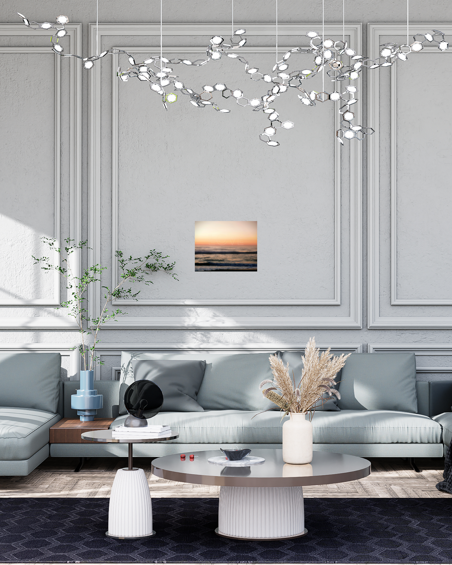 transitional style living room with cozy couches crown molding eccentric lighting and serene ocean love sunset wall decor