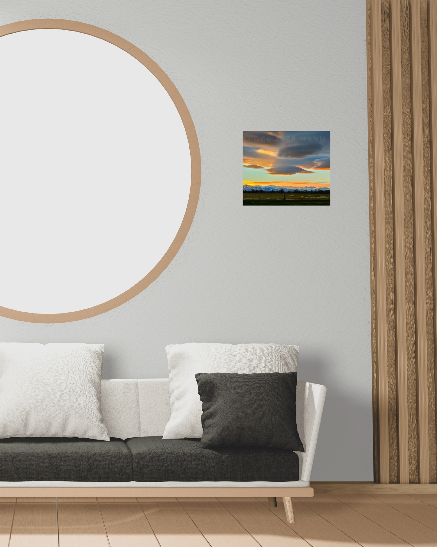 refined wooden living room decor accentuated by wall art print with nature filled scene at sunset