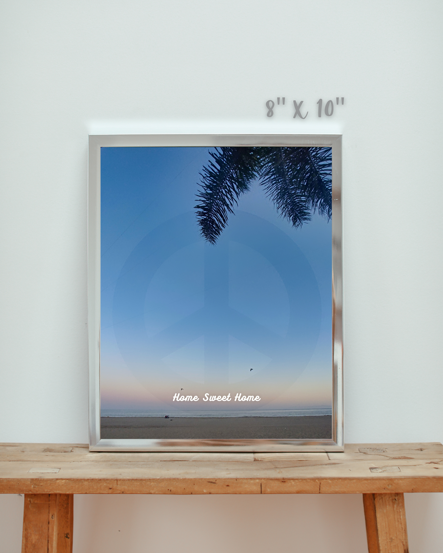 beach sunset canvas print art with a blue sky, palm tree, and peace sign hue