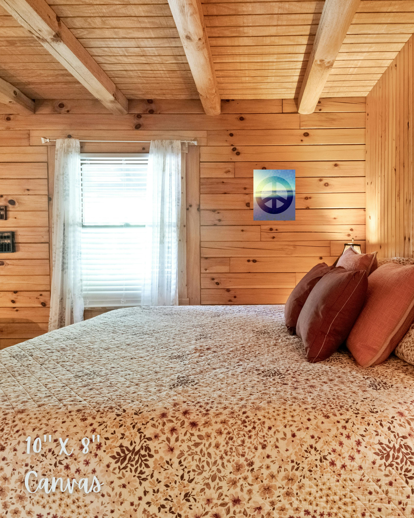 quintessential cabin bedroom in warm tones with vivid blue toned artwork displaying peace sign layer on top and serene beach ocean photo shining through