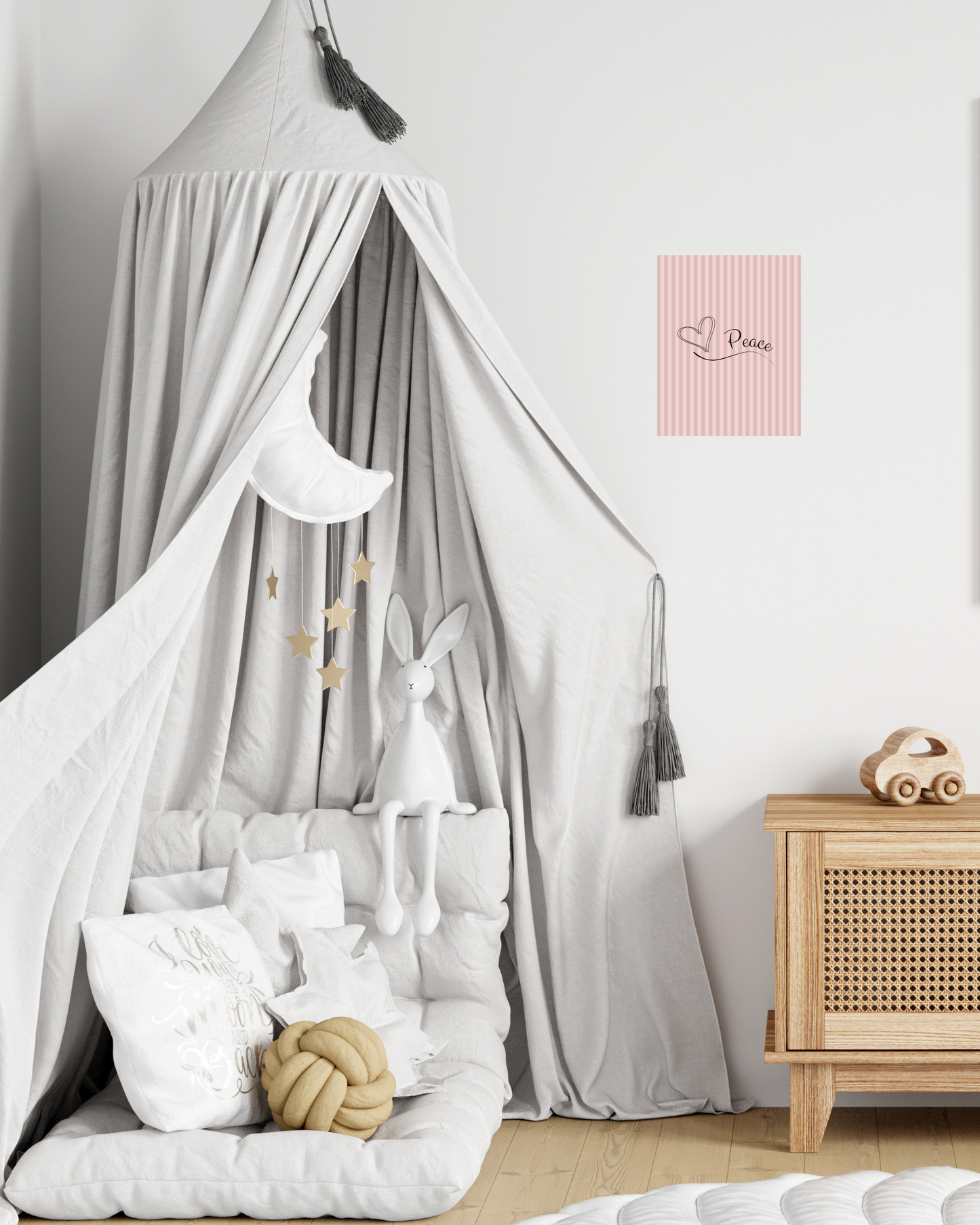 Cute young children's room with print art to accentuate. art is pink and gray pinstripes with simple whimsical peace message