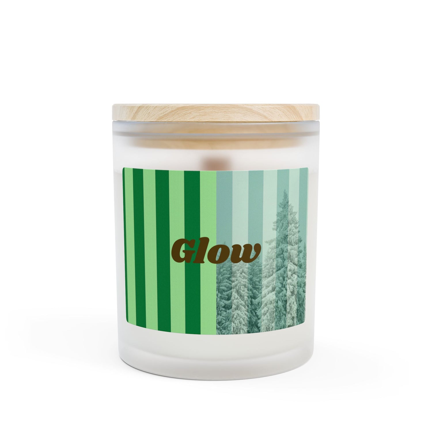 best candles for winter with frosted glass, wood top, crackling wood wick and 'glow' original design with snow covered trees photo and green stripes