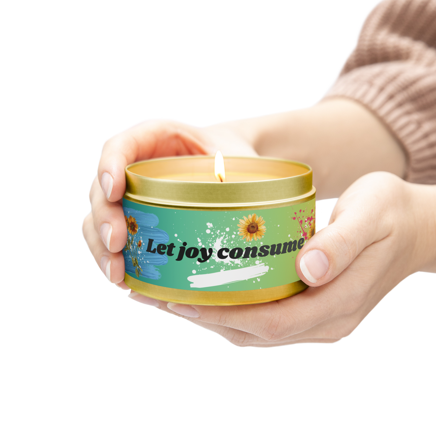 Well being scented candle unique 'let joy consume' design. Colorful, artful, floral, and original design in gold container.