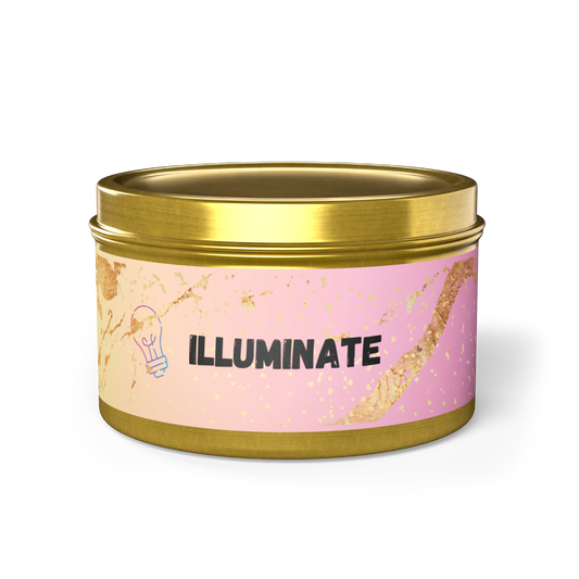 Scented eco friendly candle with soy wax in gold tin. 'Illuminate' design is accented by gold leafed overlay and enlightened pale pink background.
