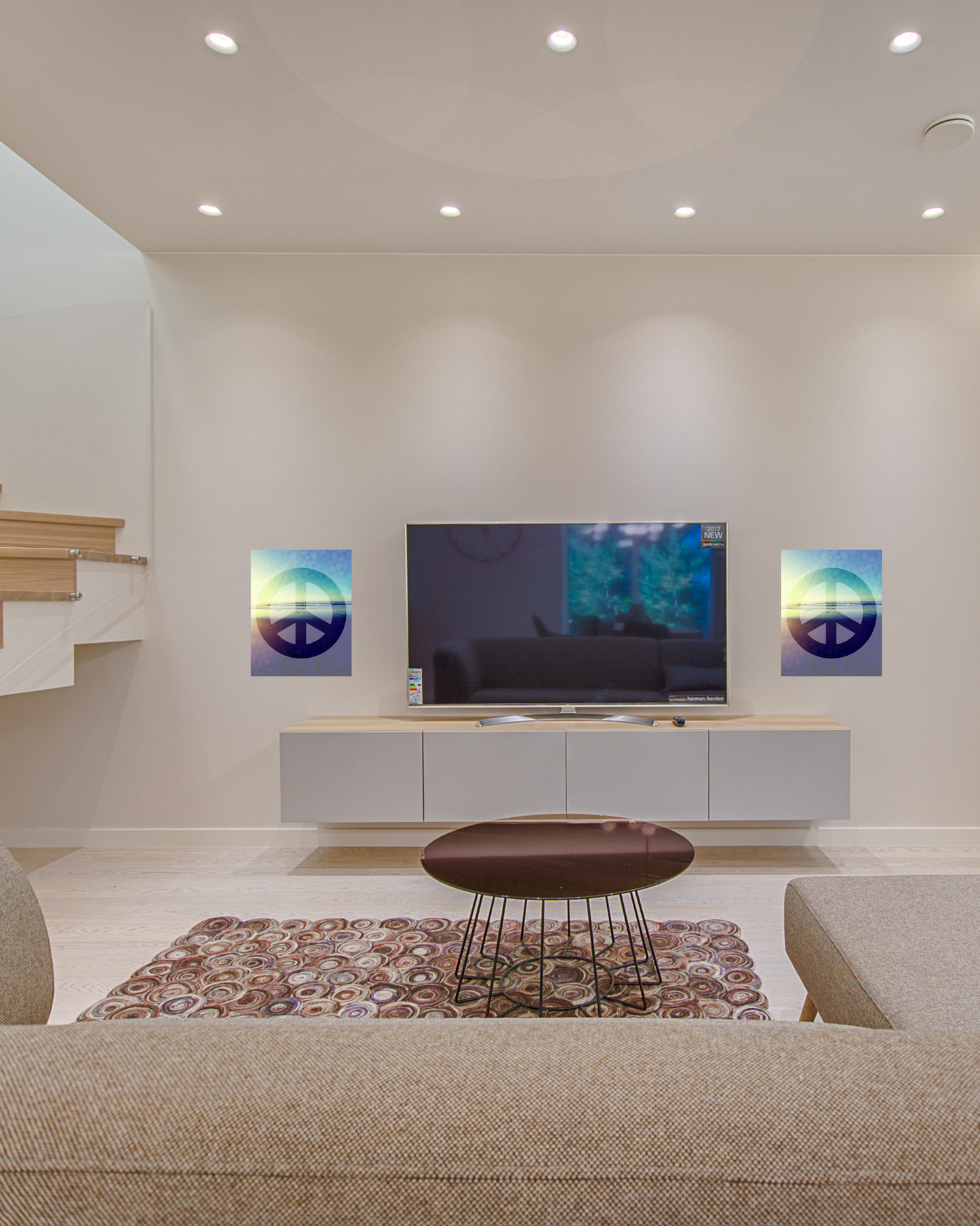 Sunken living room with great ambiance and eclectic peace sign wall art that emphasizes cool beach sunset photo as the base