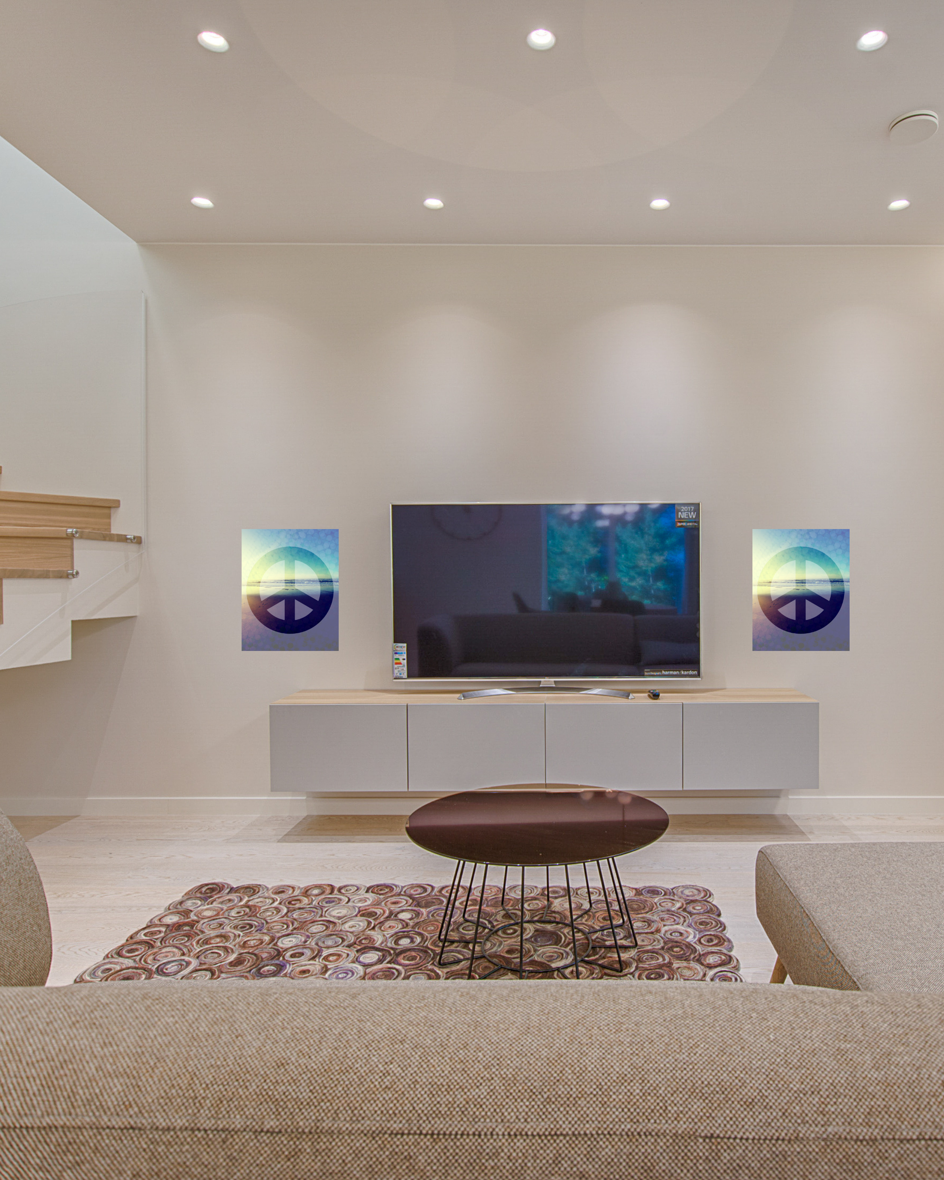 Sunken living room with great ambiance and eclectic peace sign wall art that emphasizes cool beach sunset photo as the base