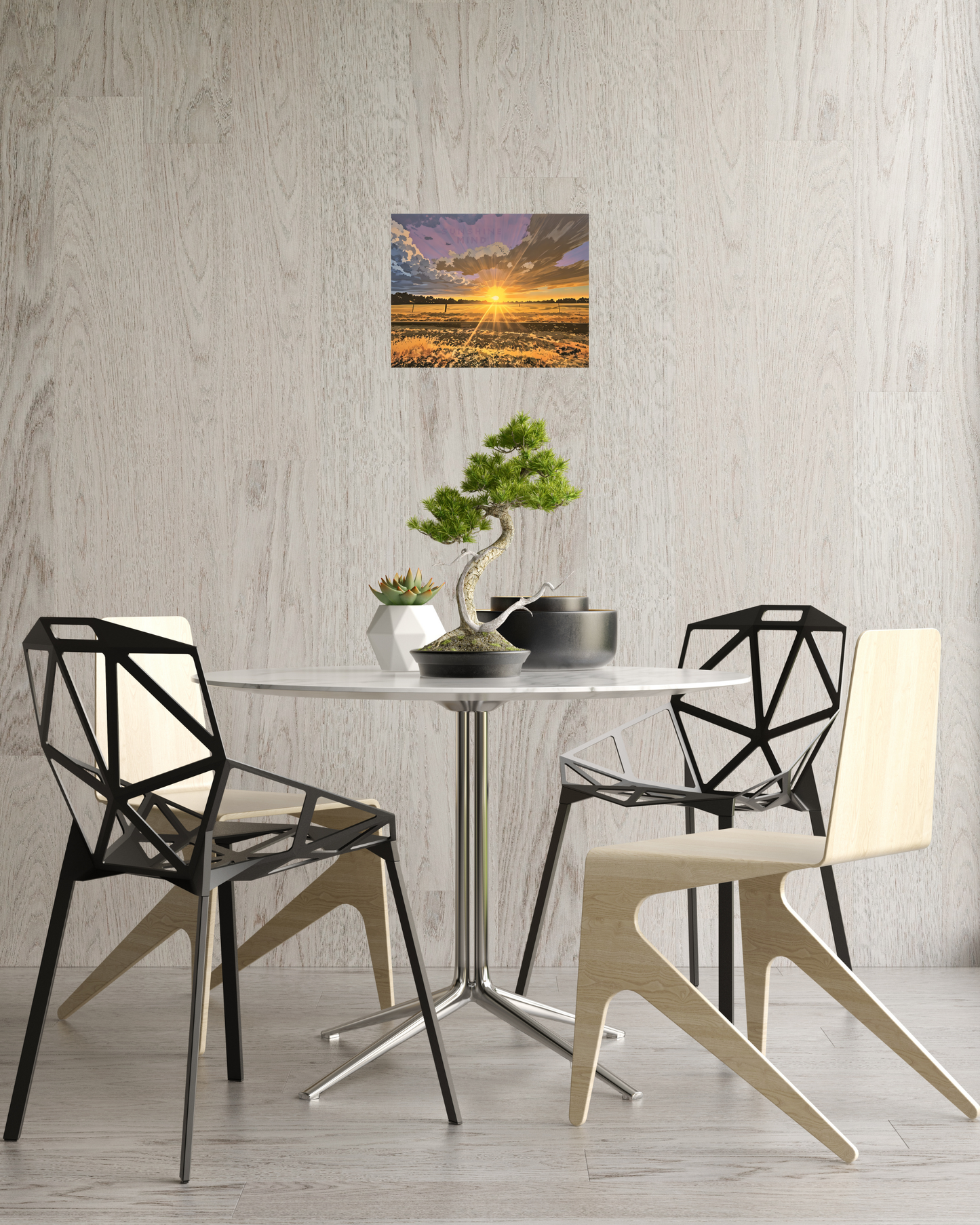 Modern dining area with a round table, bonsai tree, and featuring a scenic golden sunset wall art piece.