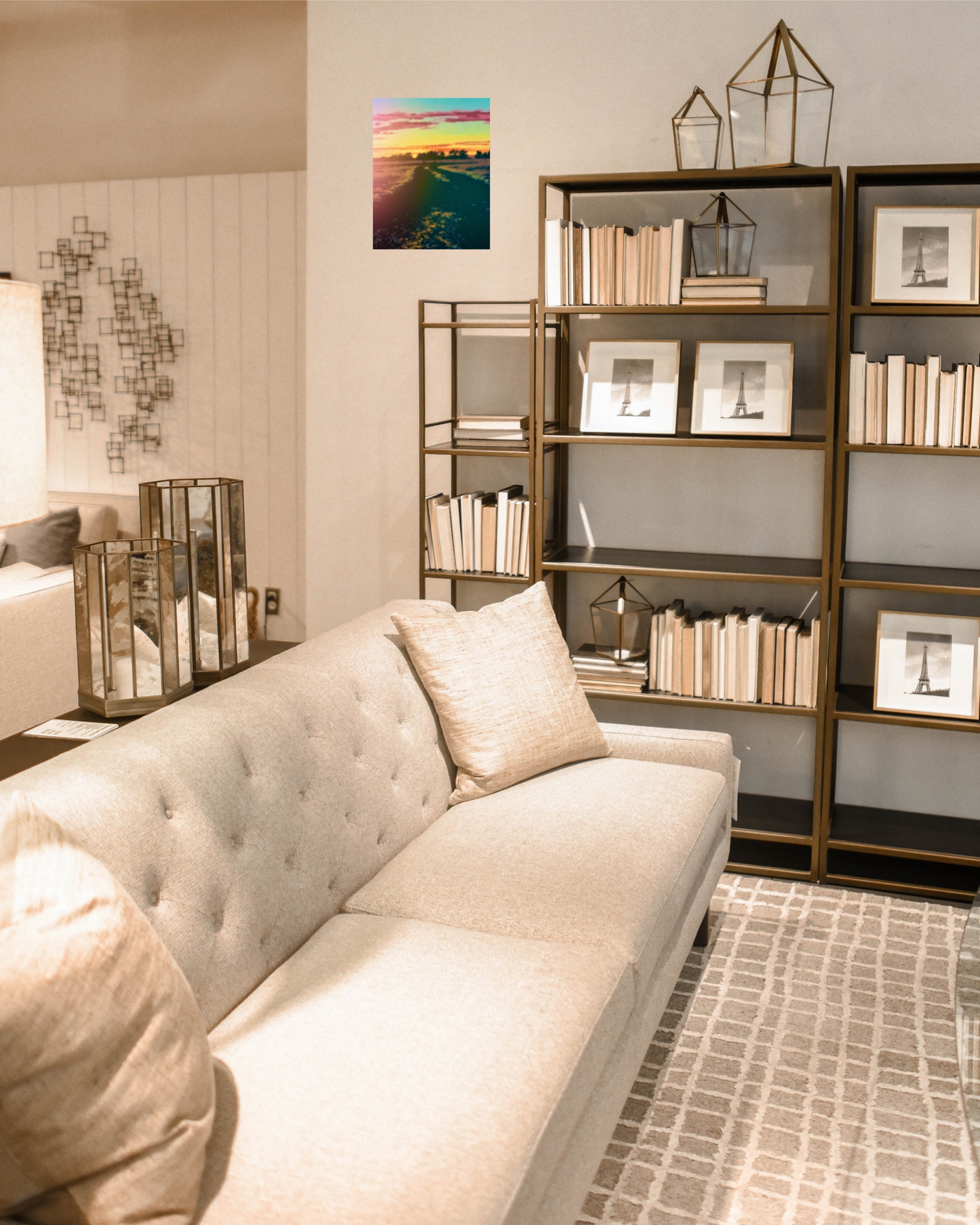 contemporary gold toned living room with vibrant country road art print