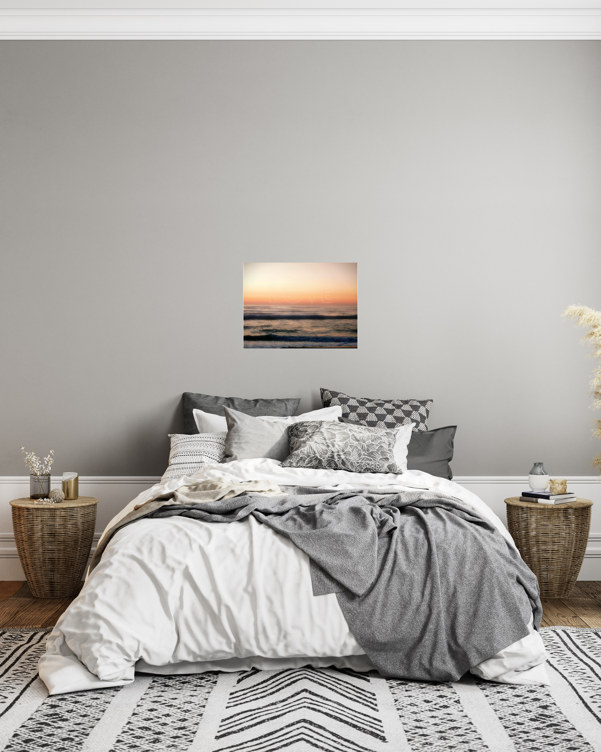 cozy bedroom with vibrant ocean sunset wall art over the bed