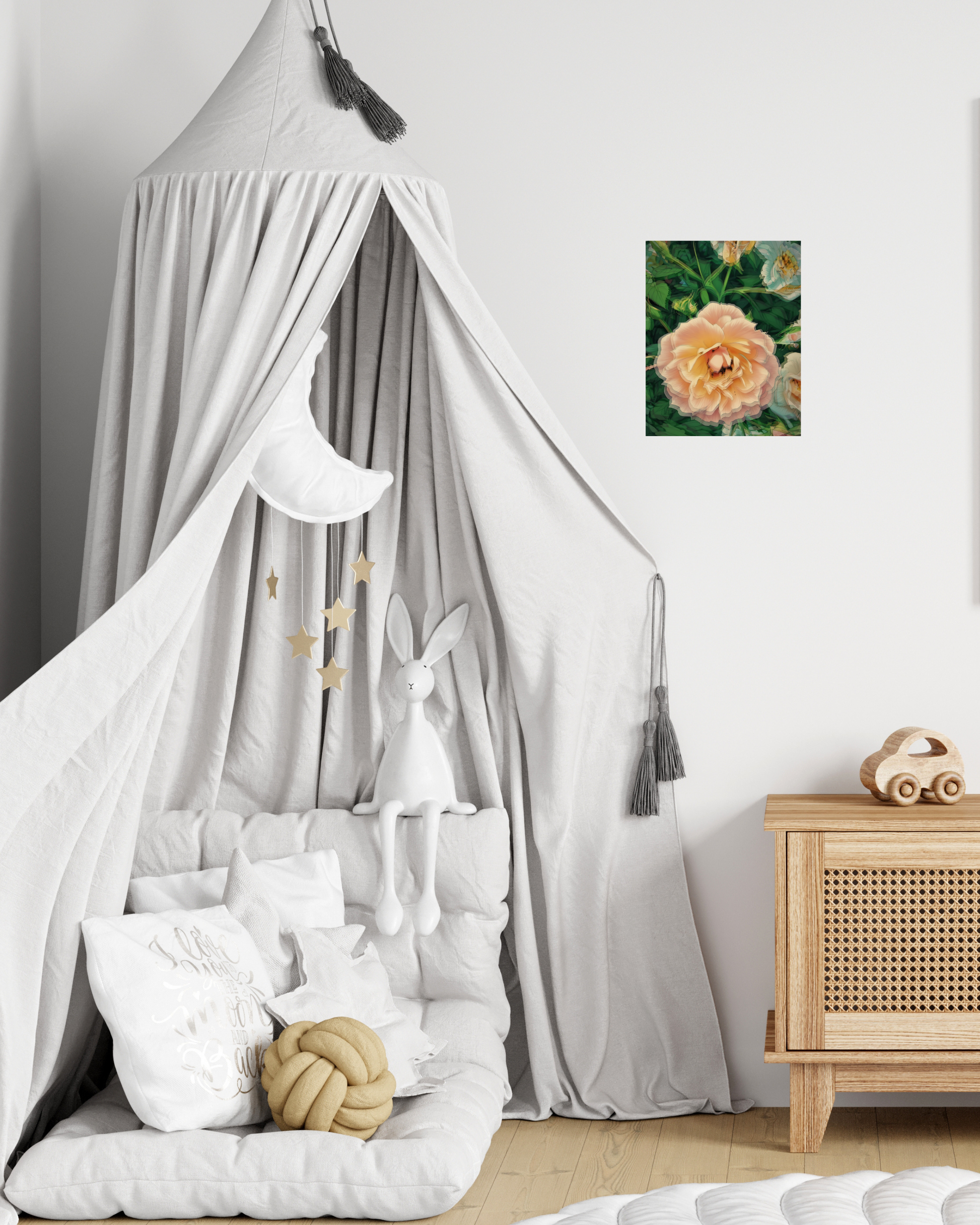young child's play room with a canopy bed, stuffed animals, and pretty pink wall art of a rose flower