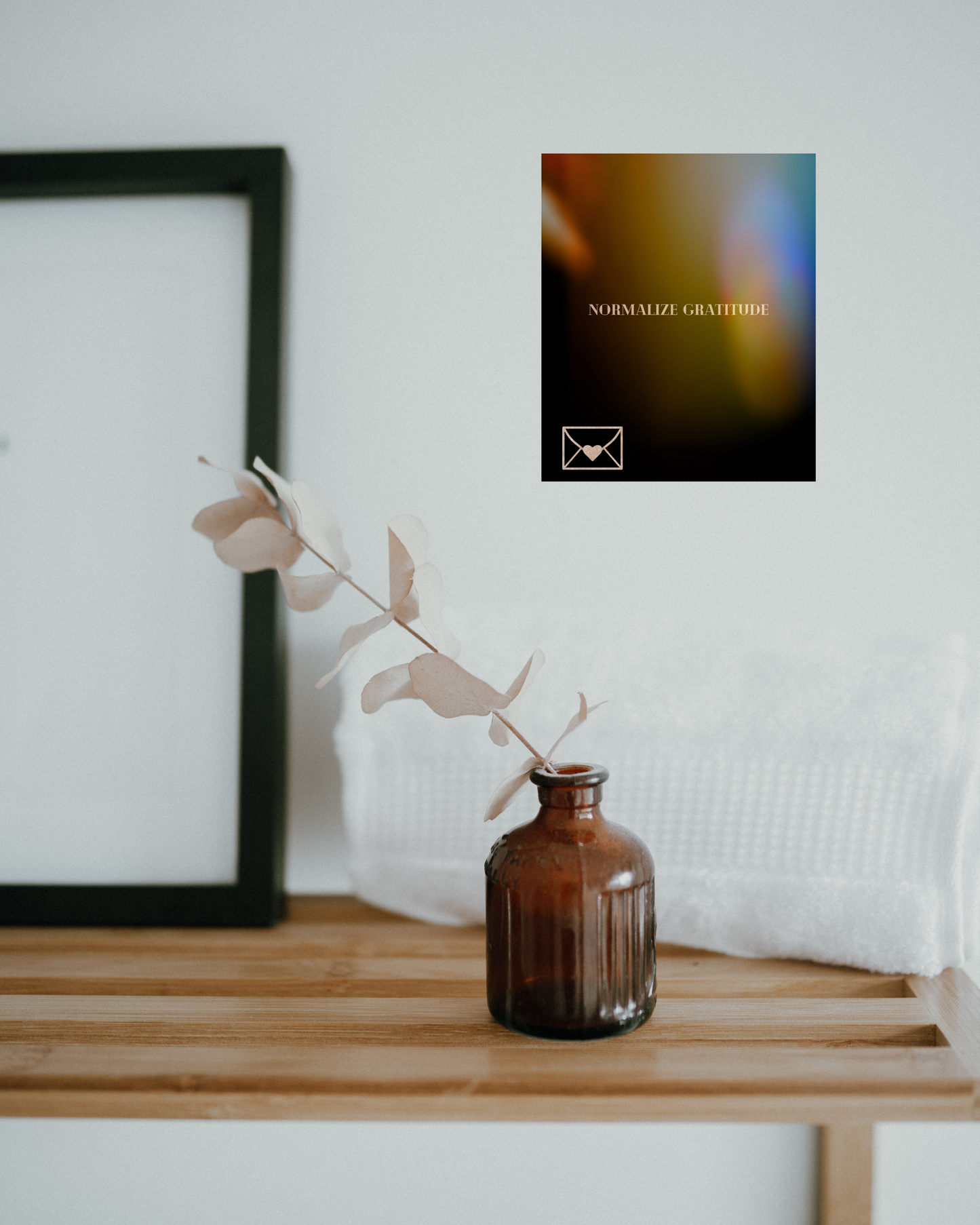 spa like room with calming decor and wall art depicting a 'sending gratitude' message